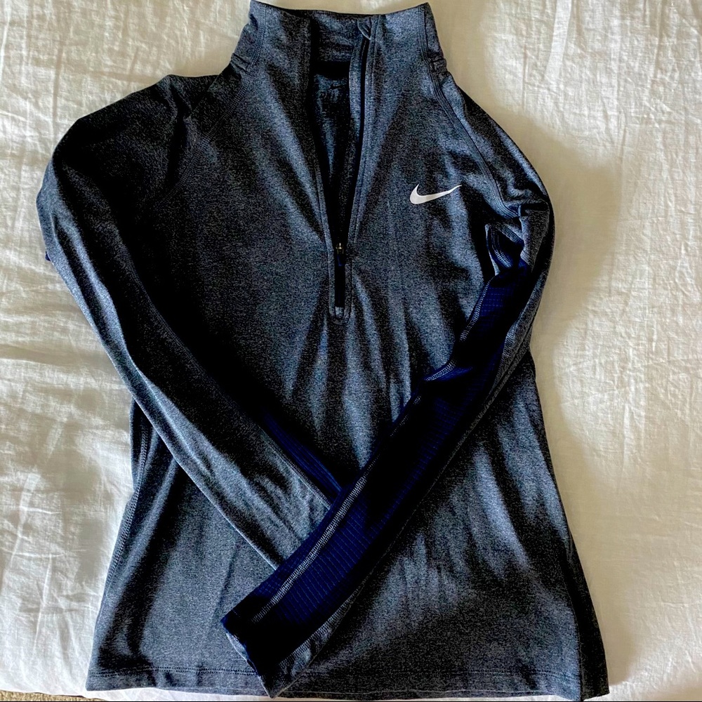 Nike 1/4 zip long sleeve athletic top. Size Small